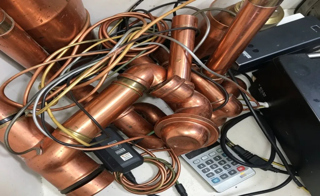 Assorted copper pipes, copper wires and household electronic cables ready for recycling in Sydney